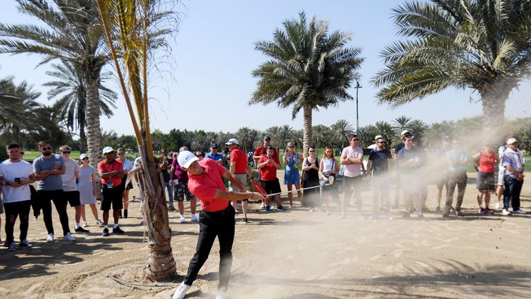 Rory McIlroy of Northern Ireland plays his second shot on the ninth hole during round three of the Abu Dhabi Championship