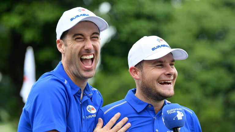 KUALA LUMPUR, MALAYSIA - JANUARY 12:  Ross Fisher and Tyrell Hatton of Europe are interviewed after their victory during the fourballs matches on day one o