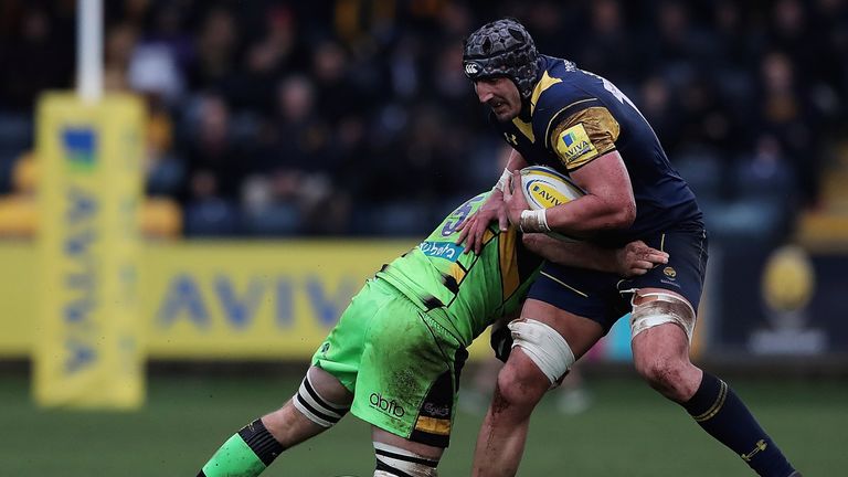Worcester lock Will Spencer is tackled by Kieran Brookes of Northampton Saints