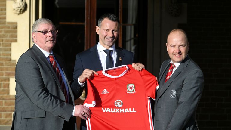 New Wales manager Ryan Giggs poses with FAW President David Griffiths (left) and FAW Chief Executive Jonathan Ford
