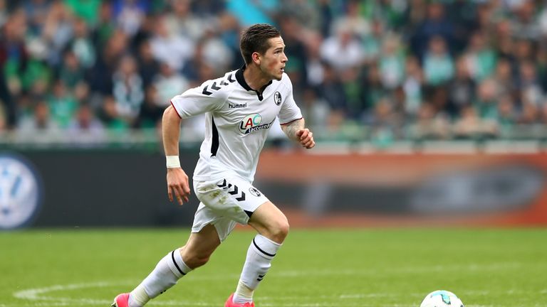 Ryan Kent of Freiburg battle for the ball during the Bundesliga match between SV Werder Bremen and Sport-Club Freiburg