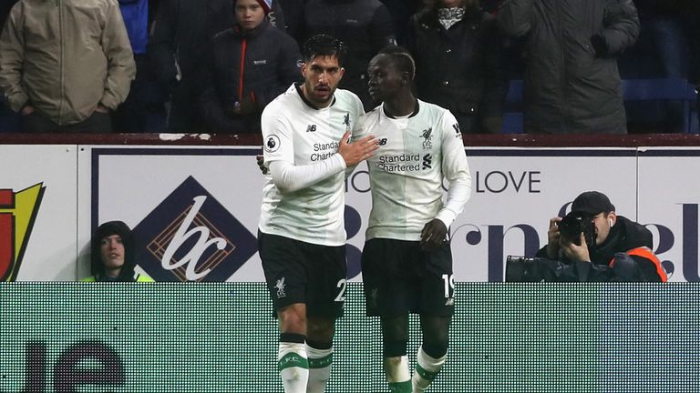 Sadio Mane of Liverpool celebrates after scoring his sides first goal with Emre Can 