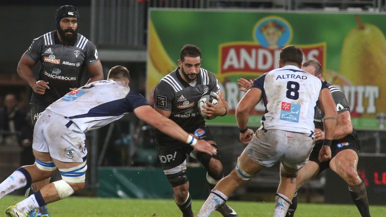 Brive's flanker Said Hireche (cap) (C) runs with the ball during the French Top14 Rugby Union match C.A.Brive versus Montpellier on December 30, 2017 at th