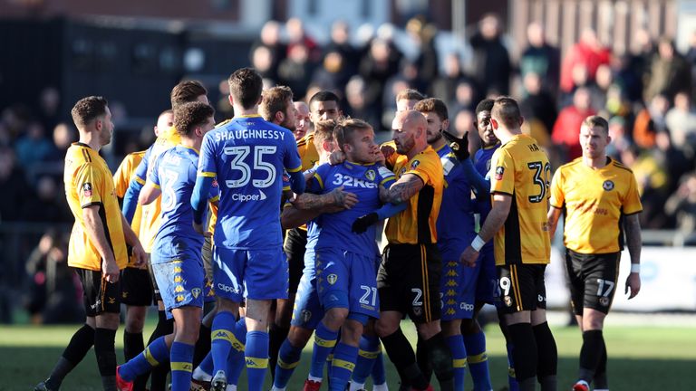 Tempers flare between the two sides resulting in Leeds United's Samuel Saiz (no. 21) being sent off