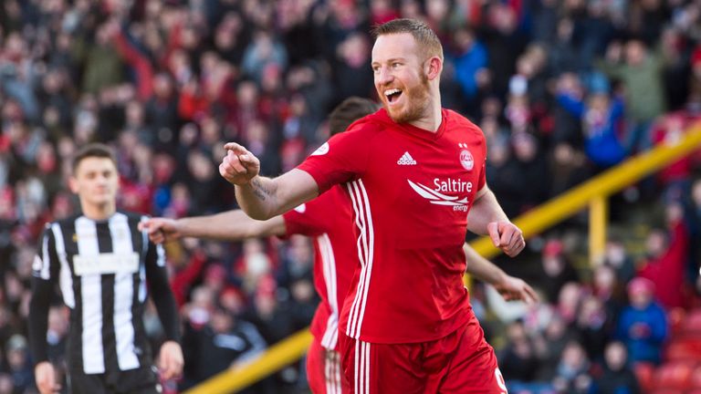 Aberdeen striker Adam Rooney celebrates his opening goal