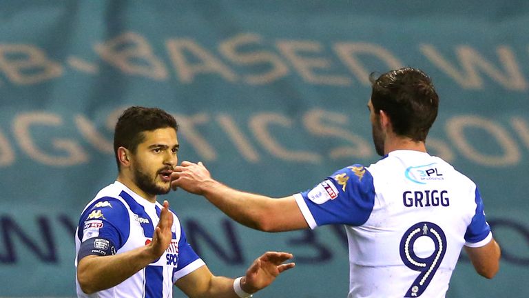 Sam Morsy celebrates his goal with Will Grigg