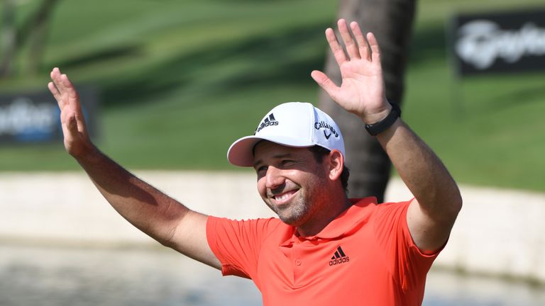 Sergio Garcia waves to the crowd after winning the Singapore Open