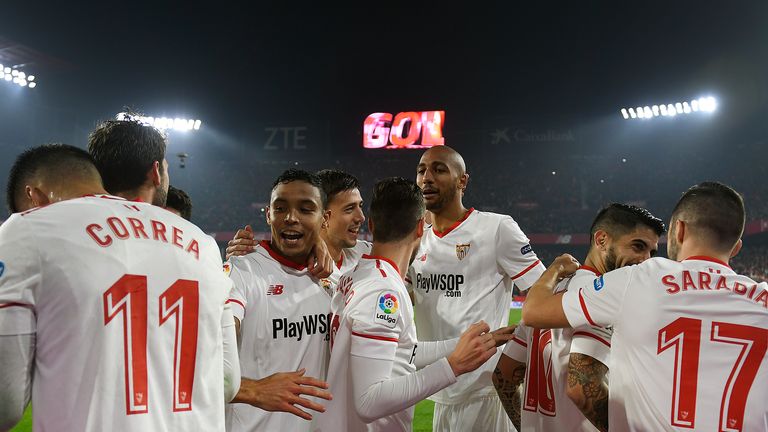 Sevilla's players celebrate their second goal during the Spanish 'Copa del Rey' (King's cup) quarter-final second leg football match between Sevilla FC and
