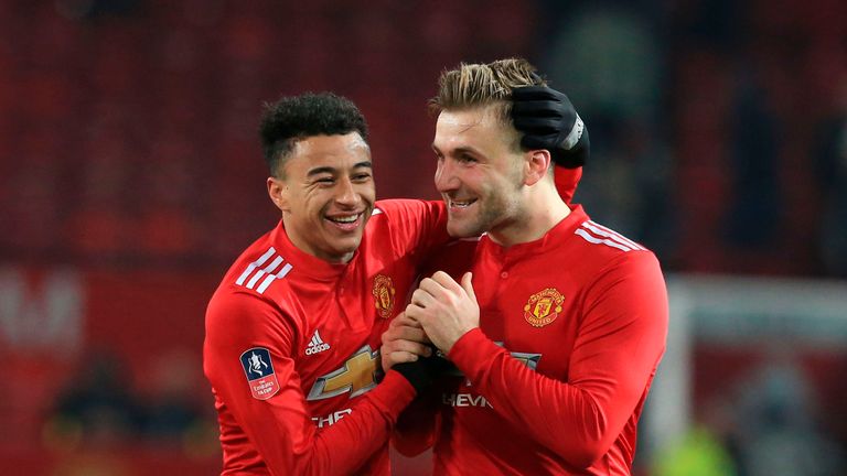 Jose Mourinho says he is 'very happy' with Luke Shaw (right)