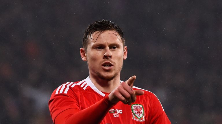 CARDIFF, WALES - MARCH 24:  Simon Church of Wales celebrates after scoring a late penalty to level the scores at 1-1 during the international friendly matc