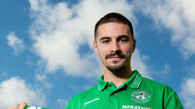 New Hibernian signing Jamie Maclaren poses for photographs after joining from SV Darmstadt 98 on loan.