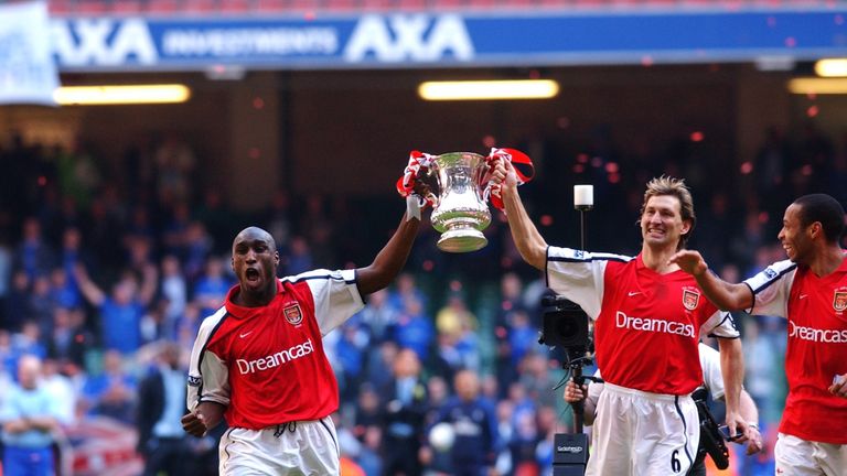 4 May 2002:  Sol Campbell and Tony Adams of Arsenal celebrate winning the cup after the AXA sponsored FA Cup Final between Arsenal and Chelsea played at th