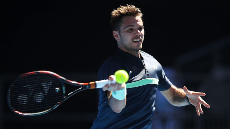 MELBOURNE, AUSTRALIA - JANUARY 16:  Stan Wawrinka of Switzerland plays a forehand in his first round match against Ricardas Berankis of Lithuania on day tw