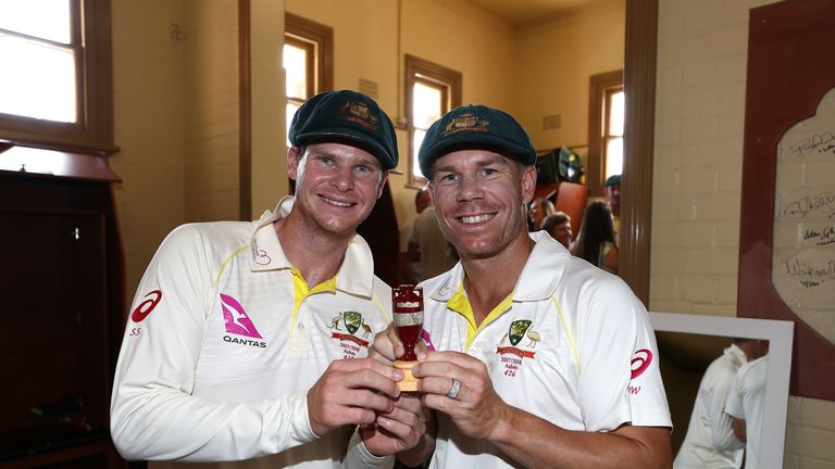 SYDNEY, AUSTRALIA - JANUARY 08:  Steve Smith and David Warner of Australia celebrate with the Ashes Urn in the change rooms during day five  of the Fifth T