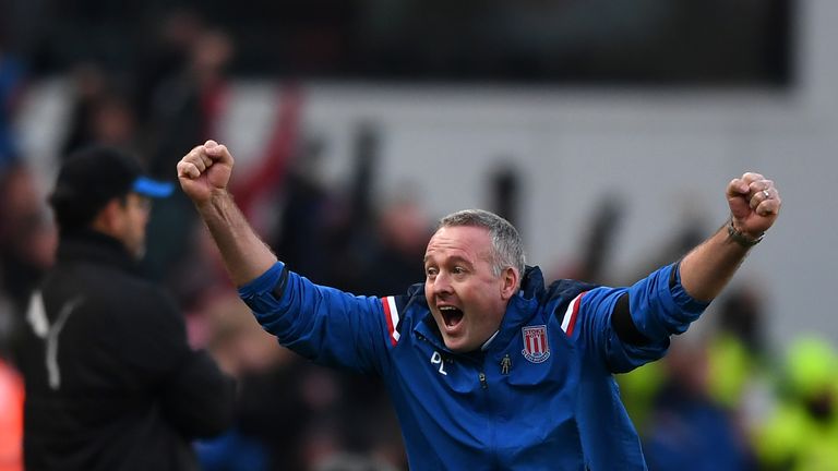 Stoke manager Paul Lambert celebrates his side's opening goal against Huddersfield