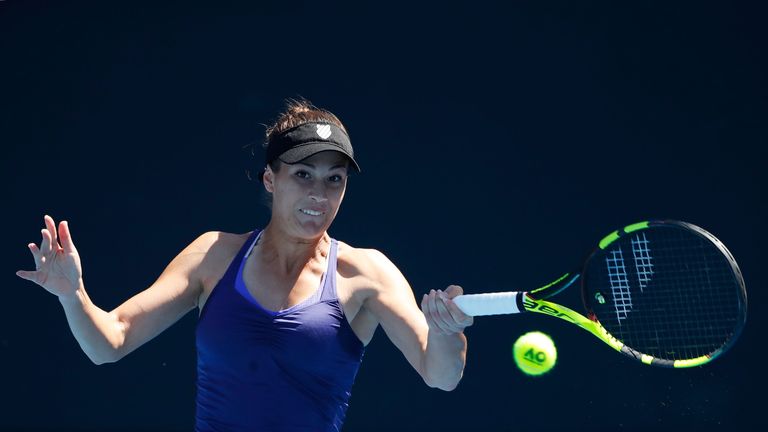 Bernarda Pera of the United States plays a forehand in her first round match against Anna Blinkova of Russia