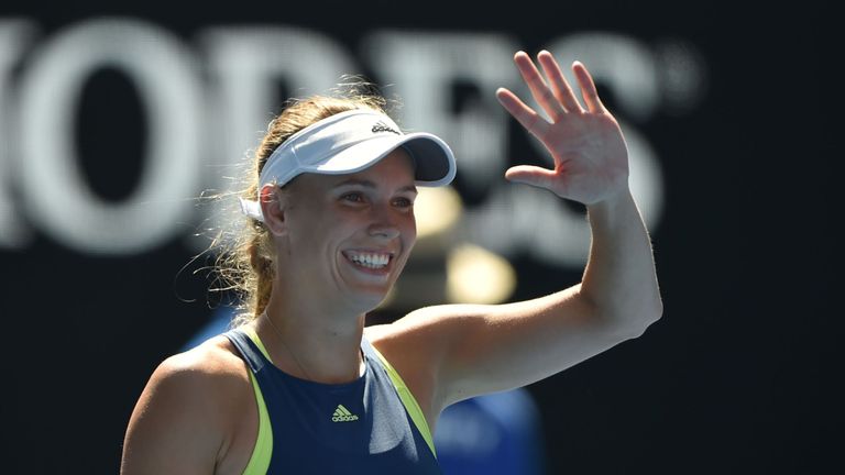 Denmark's Caroline Wozniacki celebrates beating Belgium's Elise Mertens in their women's singles semi-finals match on day 11 of the Australian Open tennis 