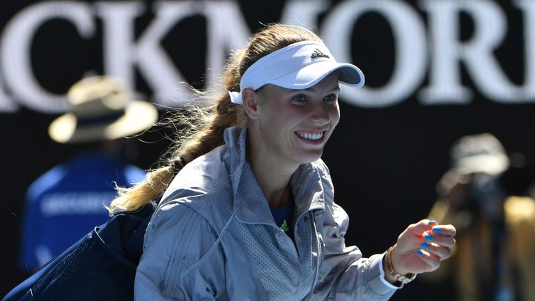 Denmark's Caroline Wozniacki celebrates beating Belgium's Elise Mertens in their women's singles semi-finals match on day 11 of the Australian Open tennis 