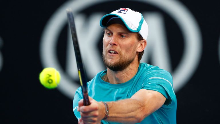 Andreas Seppi of Italy plays a backhand in his third round match against Ivo Karlovic of Croatia