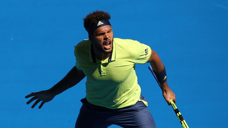 Jo-Wilfried Tsonga of France celebrates winning a point in his second round match against Denis Shapovalov of Canada