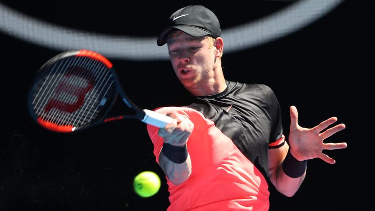 Kyle Edmund of Great Britain plays a forehand in his quarter-final match against Grigor Dimitrov of Bulgaria