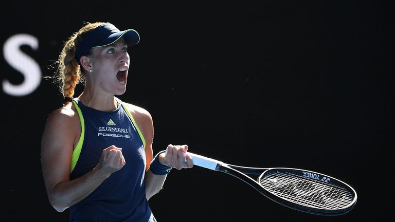 Angelique Kerber of Germany celebrates a point in her semi-final match against Simona Halep of Romania