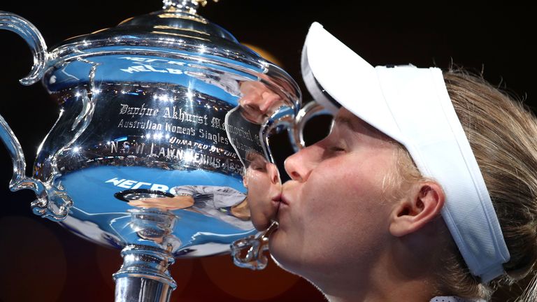 Caroline Wozniacki of Denmark poses for a photo with the Daphne Akhurst Memorial Cup after winning the women's singles title