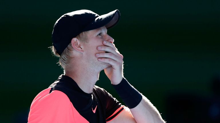 Kyle Edmund of Great Britain waits for the offical review prior to winning match point in his quarter-final match