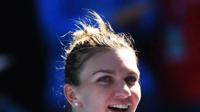 Simona Halep of Romania celebrates winning match point in her quarter-final match against Karolina Pliskova