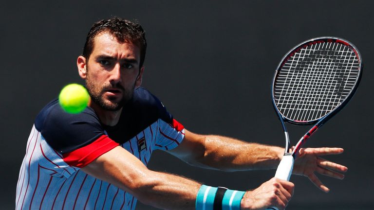 Marin Cilic of Croatia plays a backhand during a practice session on day 13 of the 2018 Australian Open