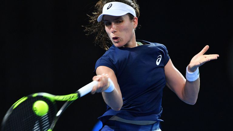 Johanna Konta of Britain hits a return against Croatia's Ajla Tomljanovic during their women's singles second round match at Pat Rafter Arena