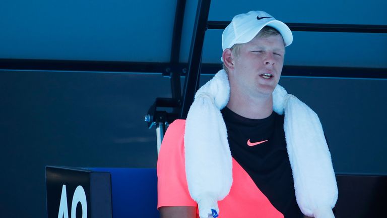 Kyle Edmund of Great Britain attempts to cool down between games in his third round match against Nikoloz Basilashvili