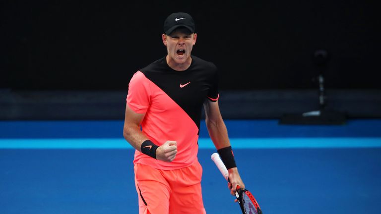 Kyle Edmund of Great Britain celebrates a point in his fourth round match against Andreas Seppi of Italy