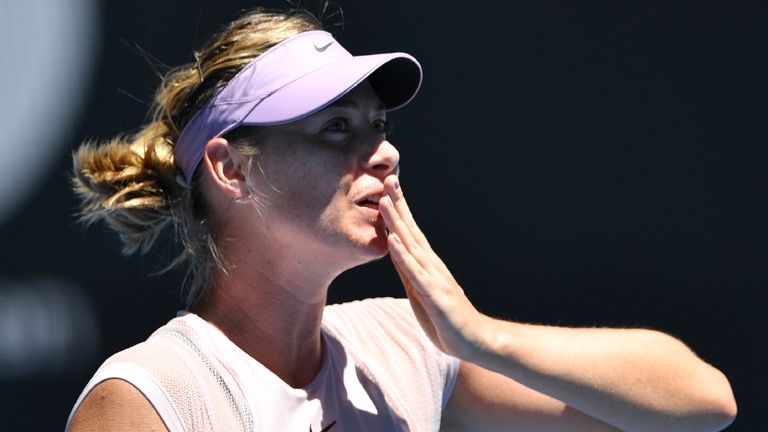 Russia's Maria Sharapova reacts after beating Latvia's Anastasija Sevastova in their women's singles second round match on day four of the Australian Open