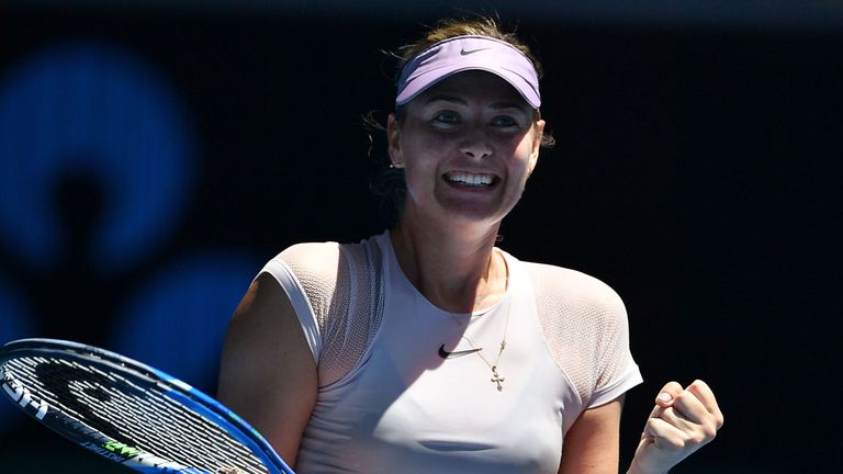 Russia's Maria Sharapova reacts after beating Germany's Tatjana Maria in their women's singles first round match on day two of the Australian Open