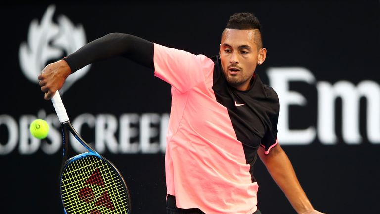 Nick Kyrgios of Australia plays a backhand in his second round match against Viktor Troicki of Serbia on day three of the Australian Open