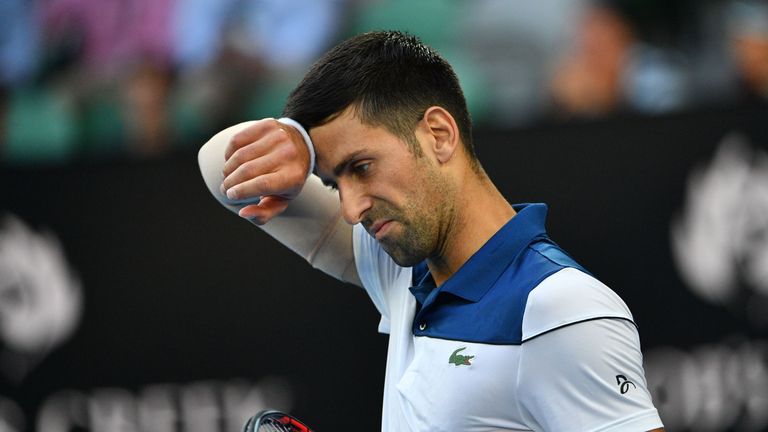 Serbia's Novak Djokovic reacts after a point against South Korea's Hyeon Chung during their men's singles fourth round match at the Australian Open