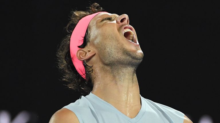 Spain's Rafael Nadal reacts against Croatia's Marin Cilic during their men's singles quarter-finals match on day nine of the Australian Open