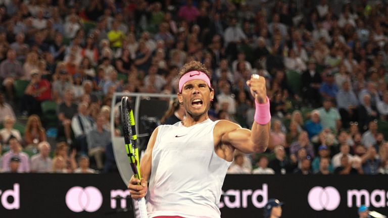 Rafael Nadal celebrates after a point against Marin Cilic during their men's singles quarter-finals match at the 2018 Australian Open