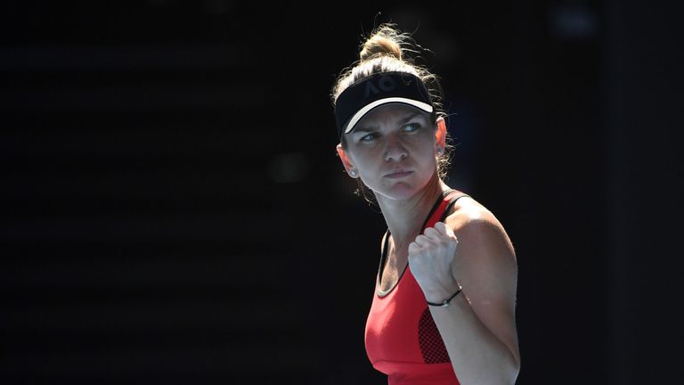 Romania's Simona Halep reacts after a point against Germany's Angelique Kerber