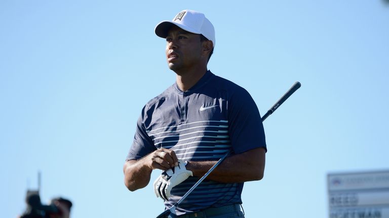 Tiger Woods looks on after playing his shot from the 11th during the second round of the Farmers Insurance Open at Torrey Pines