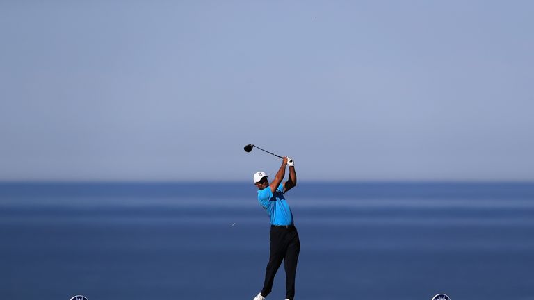 SAN DIEGO, CA - JANUARY 24:  Tiger Woods hits a tee shot on the 17th hole during the pro-am of the Farmers Insurance Open at Torrey Pines Golf Course on Ja