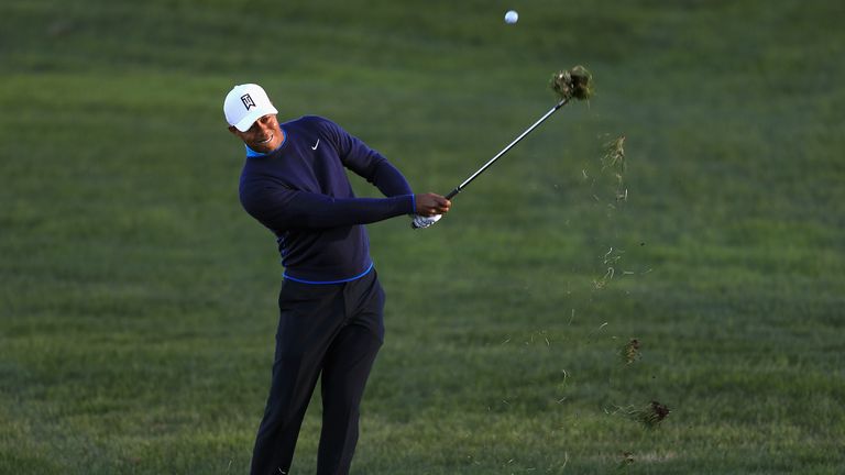SAN DIEGO, CA - JANUARY 24:  Tiger Woods hits a shot on the fifth fairway during the pro-am round of the Farmers Insurance Open at Torrey Pines Golf Course