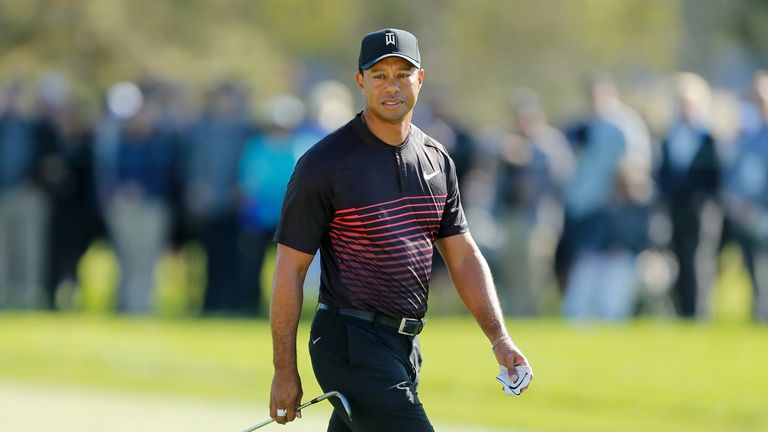 SAN DIEGO, CA - JANUARY 25:  Tiger Woods walks up to the first green during the first round of the Farmers Insurance Open at Torrey Pines South on January 