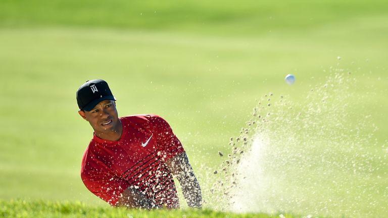 SAN DIEGO, CA - JANUARY 28:  Tiger Woods plays a shot from a bunker on the 15th hole during the final round of the Farmers Insurance Open at Torrey Pines S
