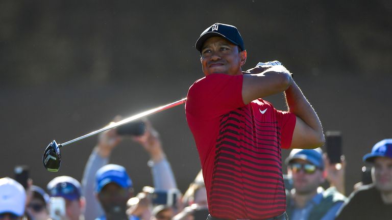 SAN DIEGO, CA - JANUARY 28:  Tiger Woods plays his shot from the 14th tee during the final round of the Farmers Insurance Open at Torrey Pines South  on Ja