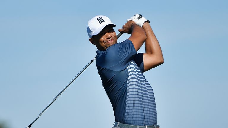 Tiger Woods plays his shot from the 18th tee during the second round of the Farmers Insurance Open at Torrey Pines North 
