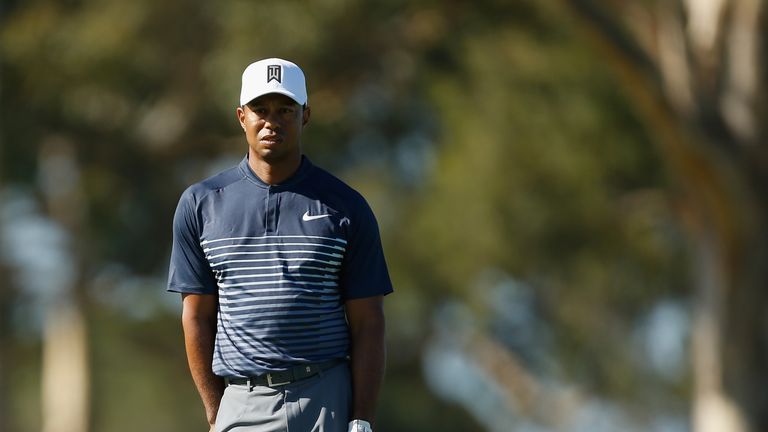 Tiger Woods looks on on the 13th green during the second round of the Farmers Insurance Open at Torrey Pines North 