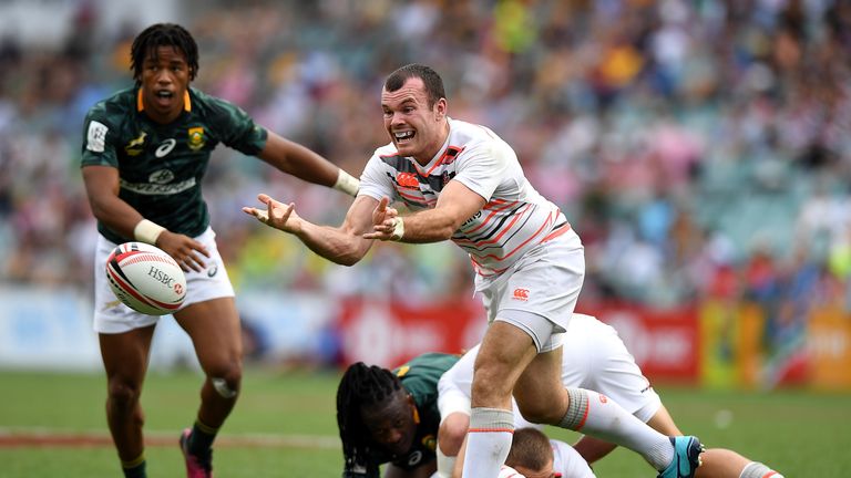 Tom Bowen of England passes the ball in the match against South Africa 