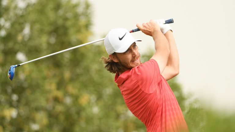 Tommy Fleetwood of England plays his shot from the third tee during the final round of the Abu Dhabi HSBC Championship